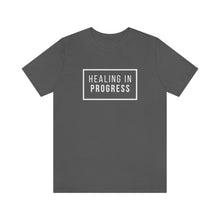 Load image into Gallery viewer, Healing In Progress - Unisex Jersey Short Sleeve Tee
